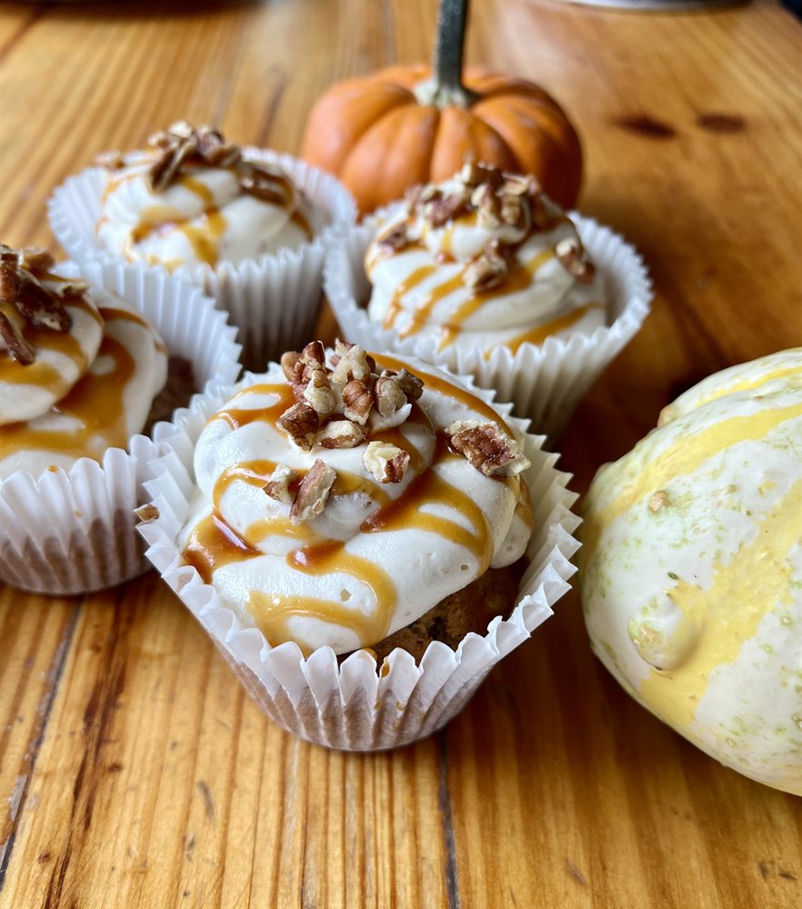 Pecan pie cupcakes with caramel drizzle and candied pecans